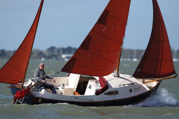 Drascombe drifter 22 sailboat under sail