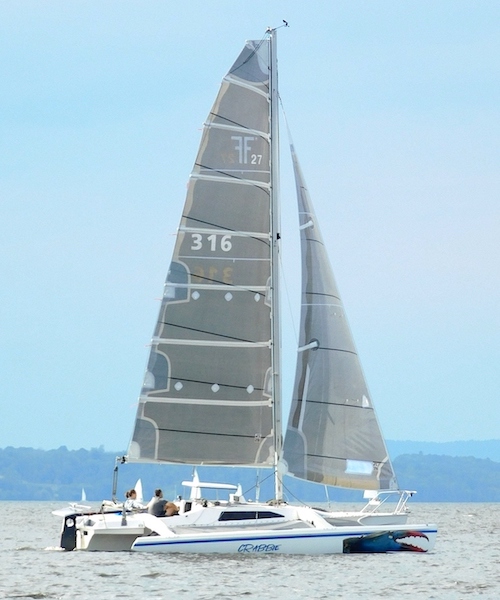 F 27 sport cruiser sailboat under sail