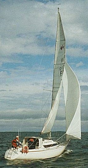 H 323 sailboat under sail