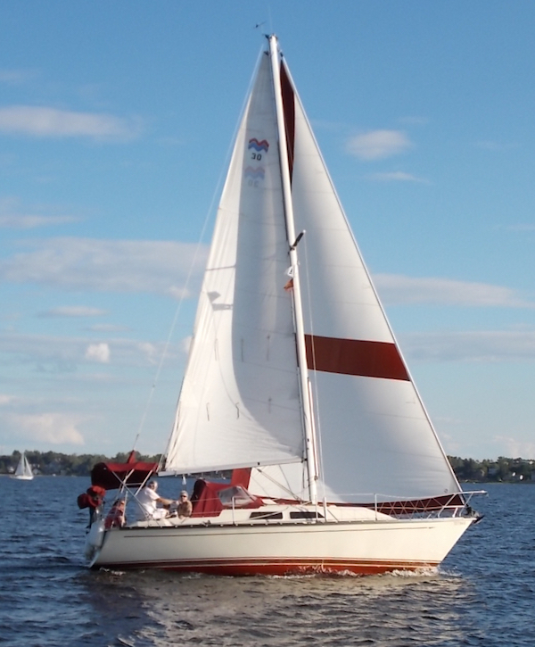 Mirage 30 sailboat under sail