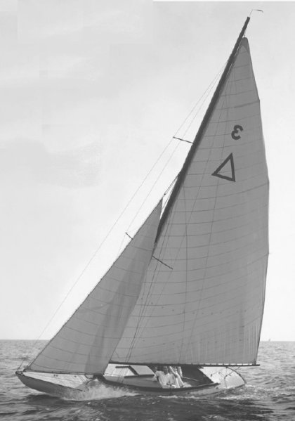 Triangle one design sailboat under sail