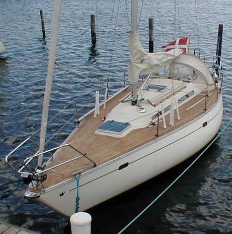 Blue leth 32 sailboat under sail