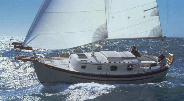Dana 24 pacific seacraft sailboat under sail