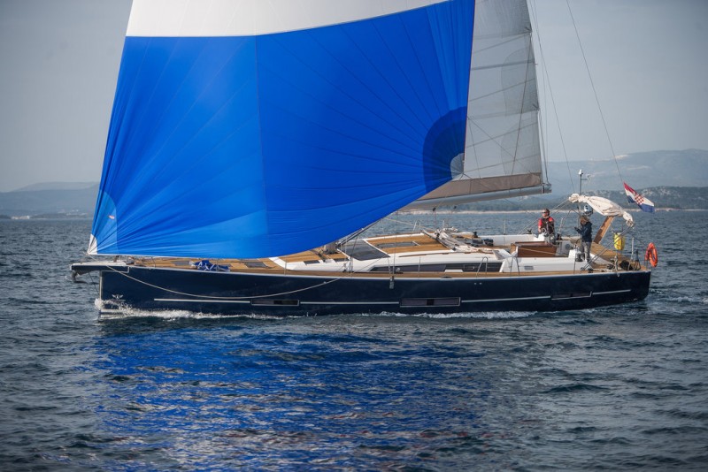 Dufour 560 grand large sailboat under sail