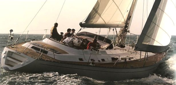 Dufour 56 prestige sailboat under sail