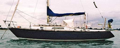 Hustler 30 sailboat under sail