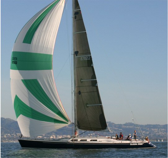 Macgregor 65 sailboat under sail