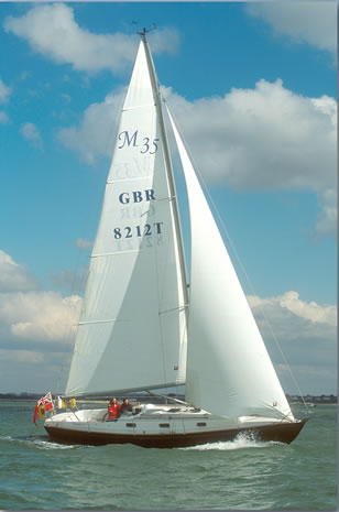 Mystery 35 hunter sailboat under sail