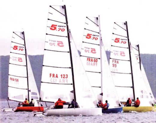 Open 570 sailboat under sail