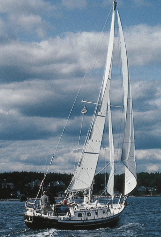Pacific seacraft 34 sailboat under sail