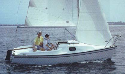 Precision 165 sailboat under sail