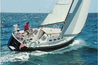 Precision 28 sailboat under sail