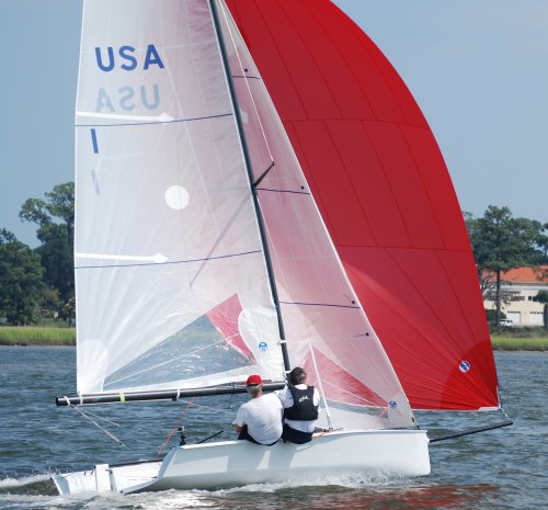 Vx one design sailboat under sail