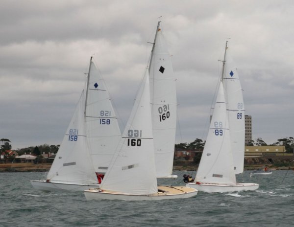 Yachting world diamond sailboat under sail